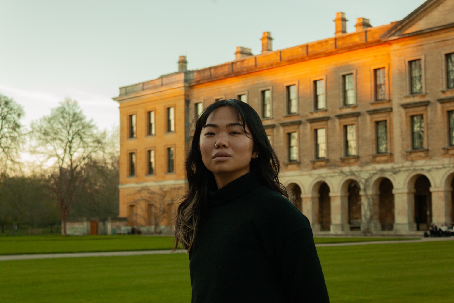Carina Uchida outdoors in front of an Oxford college building